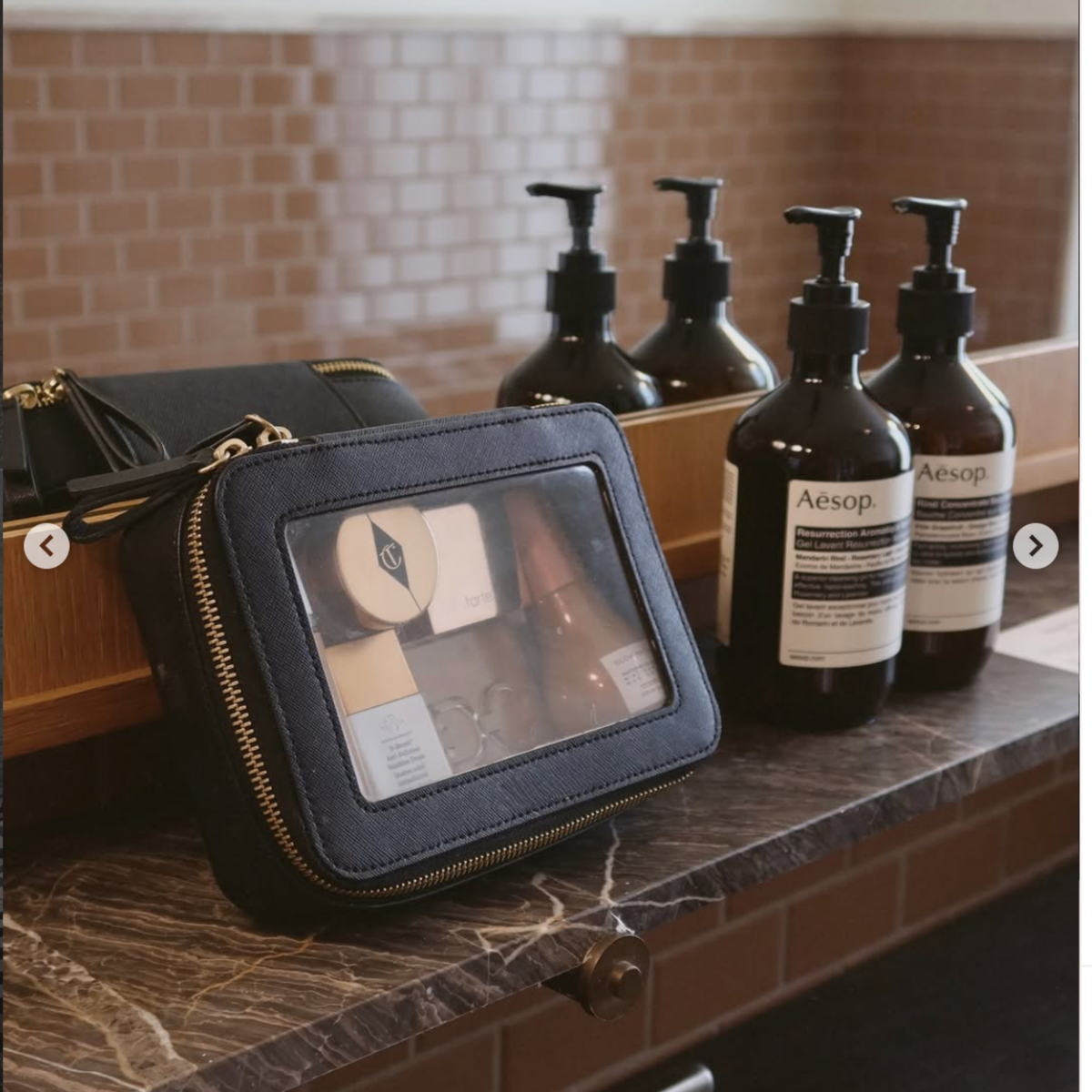 Single Zip Case in Black on a bathroom counter