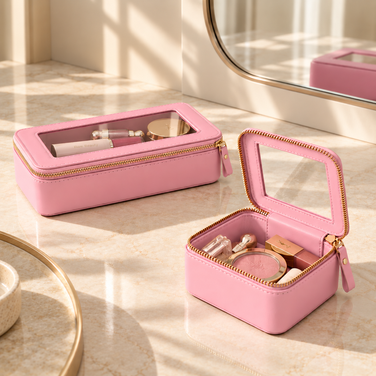 The Everyday Duo in Pink Aura: Single Zip Case and Petite Case open with makeup