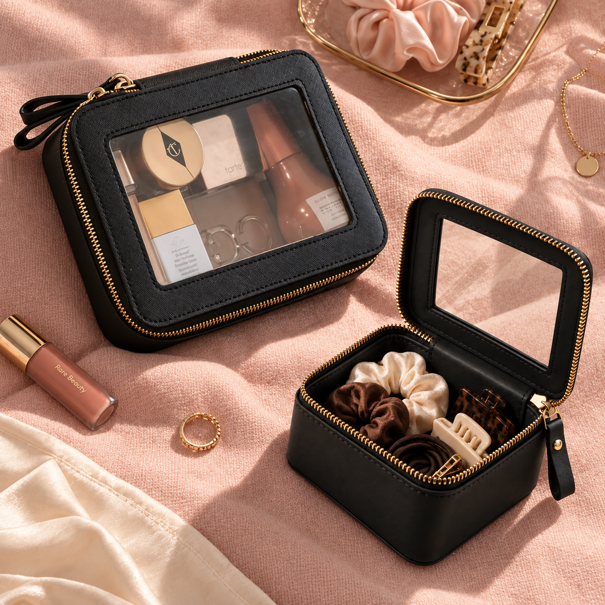 The Everyday Duo in Black: Single Zip Case with makeup and Petite Case open with hair accessories